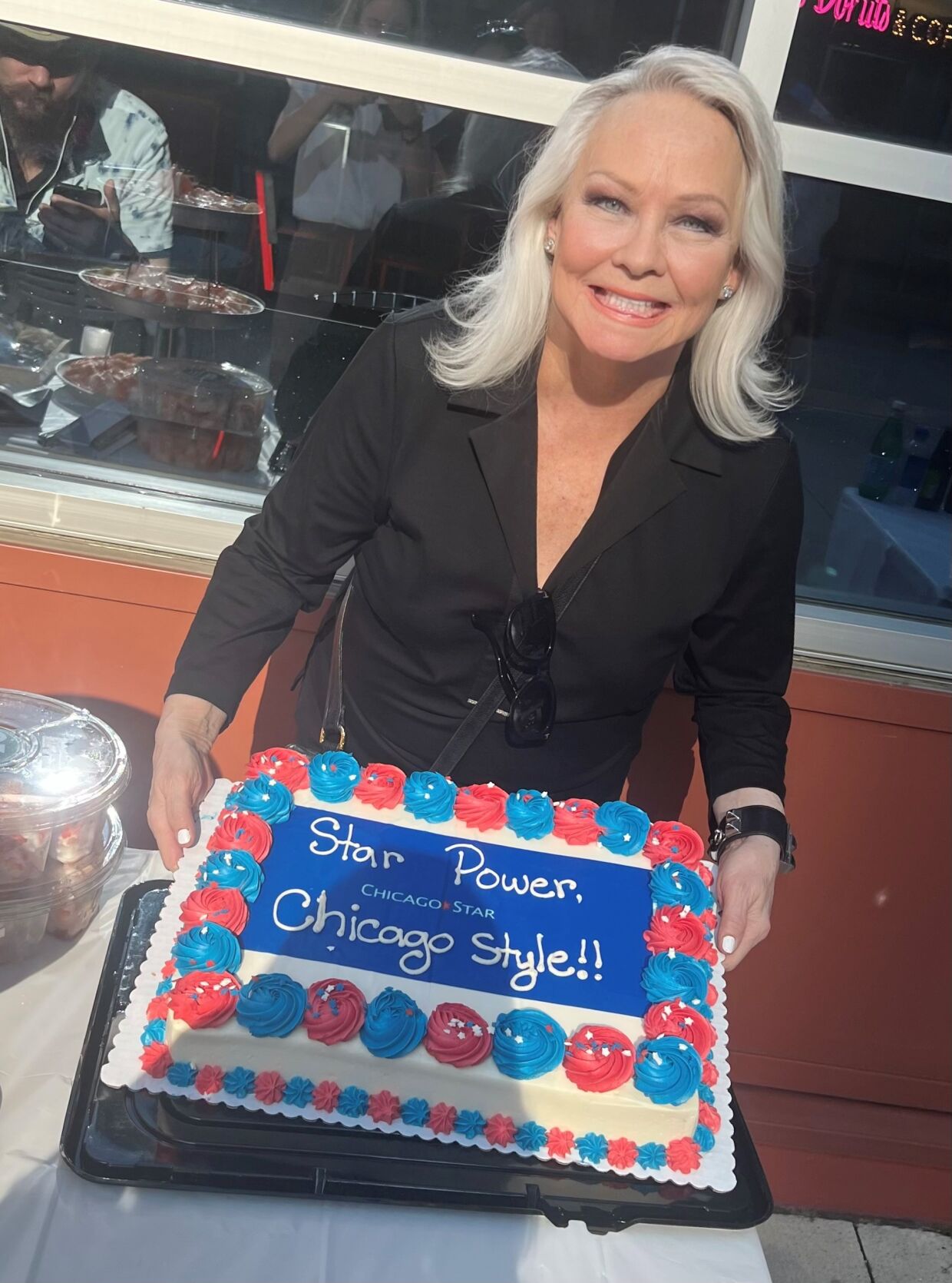 Chicago Star wishes you a happy summer! (Photo of Candace Jordan by Juan Alvarez, cake by Mariano's Lakeshore East)